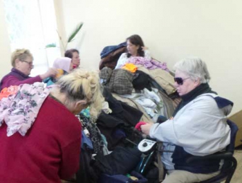 Мелитопольцы с инвалидностью получили одежду и одеяла
