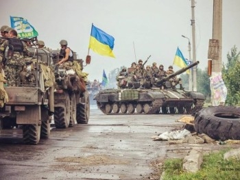 Украинские войска занялись обороной Мариуполя фото