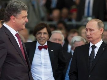 Порошенко и Путин договорились прекратиться огонь на Донбассе фото