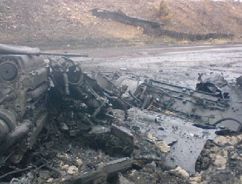 Под Иловайском обнаружены тела 26 погибших украинских солдат фото