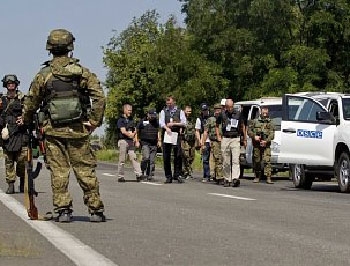 Украина, Россия и ОБСЕ начали создавать в Донбассе буферную зону фото