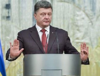 Порошенко подписал закон об особом статусе части Донбасса фото