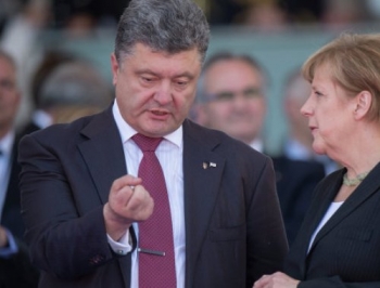 Обнародованы подробности переговоров Порошенко с Меркель и Олландом фото
