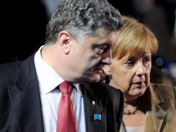 Порошенко, Меркель и Олланд обсудили минские соглашения фото