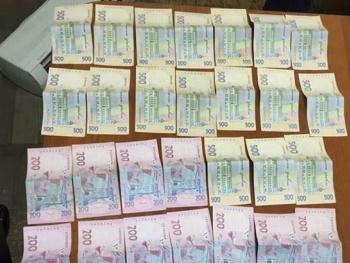 В Херсонской области на взятке задержан оперуполномоченный Нацполиции фото