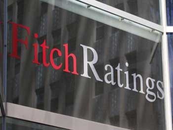 Fitch понизил рейтинг ПриватБанка до ограниченного дефолта фото