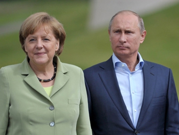 Стало известно, когда Меркель и Путин поговорят об Украине фото
