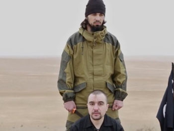 ИГИЛ опубликовало видео с казнью российского офицера фото