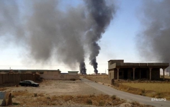 В Ливии по меньшей мере 141 человек погиб в результате атаки на авиабазу на юге страны фото