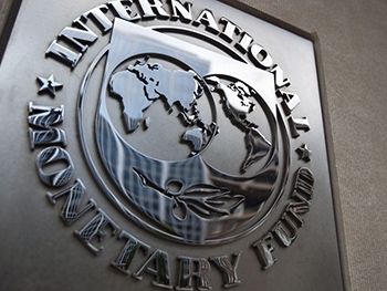 МВФ отложил перевод транша Украине из-за спора о земле фото