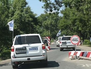 ОБСЕ: В Луганске грузовики с военной техникой фото