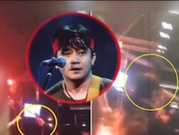 Музыкант обезвредил зрителя, угрожавшего ему пистолетом во время концерта фото