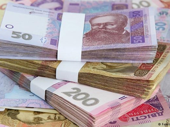 Киевлянин пытался переслать в Гонконг 24 кило бумажных гривен фото