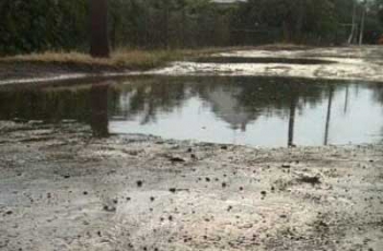 Десятки улиц частного сектора Мелитополя горько плачут за асфальтом фото