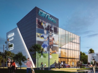 В Мелитополе ночью обстреляли здание торгово-развлекательного центра  фото