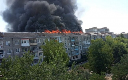 В Новой Каховке горит многоэтажка фото