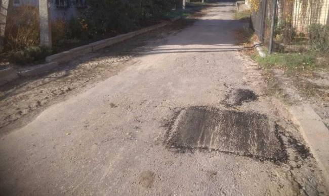 В Мелитополе ремонтируют улицы на спуске фото