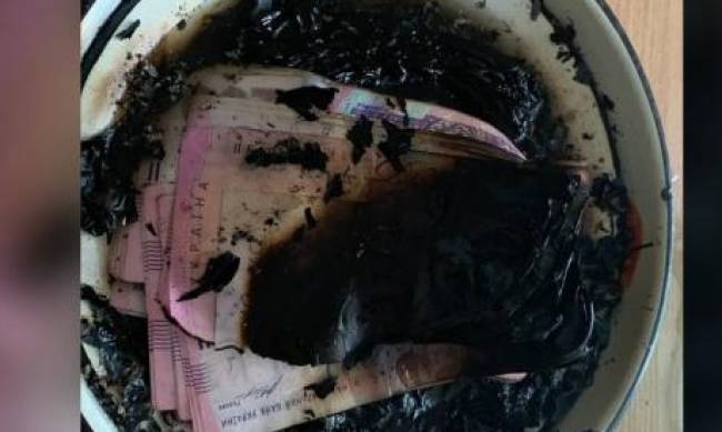 В Днепре женщина сожгла 50 тысяч гривен, потому что ей велели голоса в голове фото
