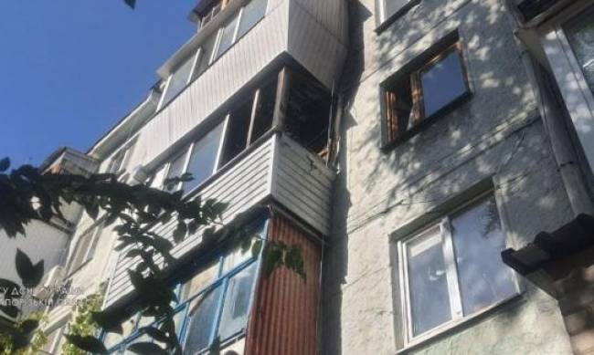 В Запорожье соседи спасли из пожара  5-летнего мальчика - один остался в квартире фото