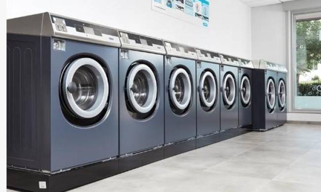 Профессиональное оборудование для прачечных от компании «Континент прачечное оборудование» фото